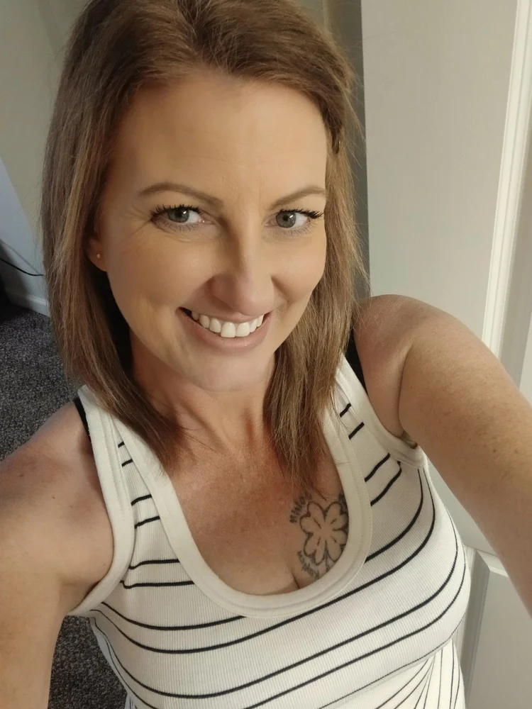 Amy smiling at home